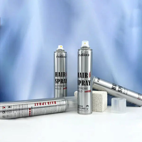 Three cans of hair spray with 'maliao' branding on a light blue background