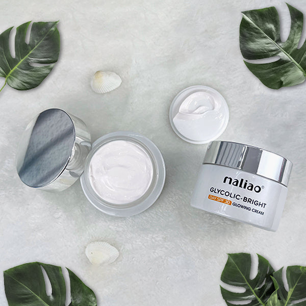 Maliao skincare cream jars with green leaves on a light background. maliao.pk