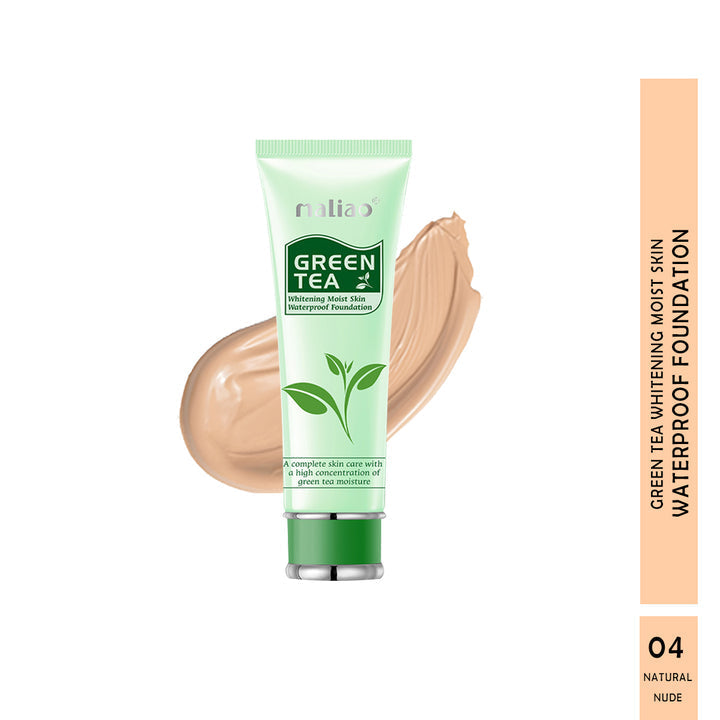 Green tea foundation tube with a swatch of beige color on a white background