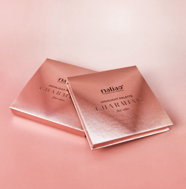 Two rose gold 'maliao' highlight palette boxes on a pink background