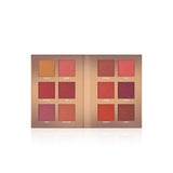 Makeup palette with various shades of red and brown on a white background