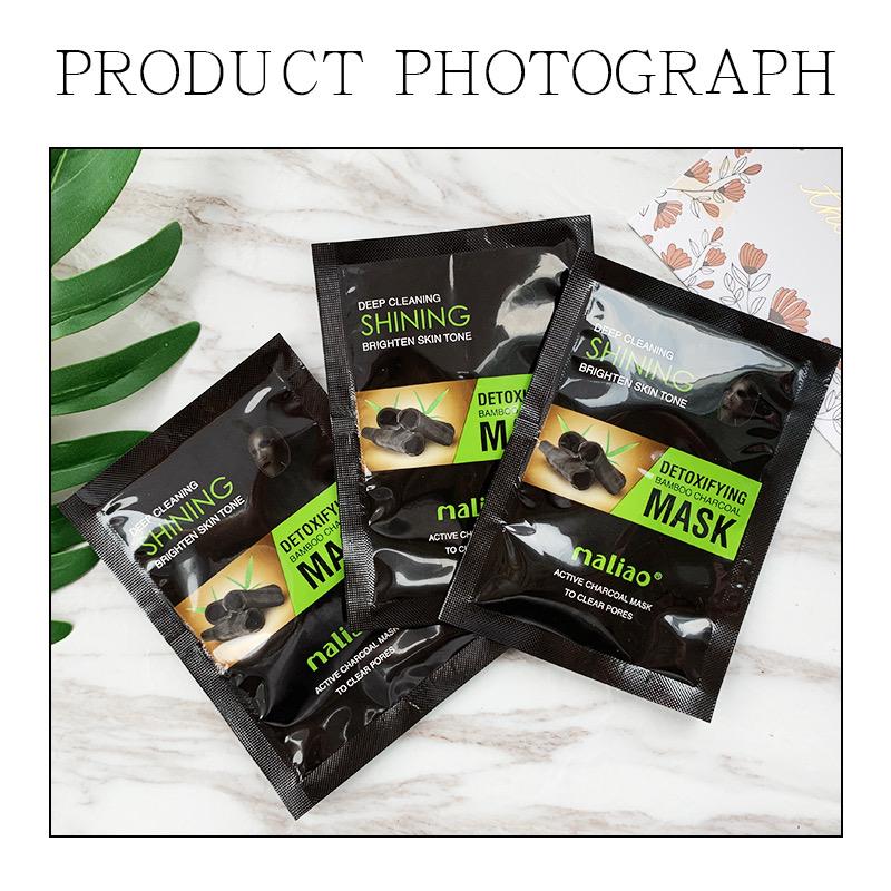 Three facial mask packets on a marble surface with green leaves. maliao.pk
