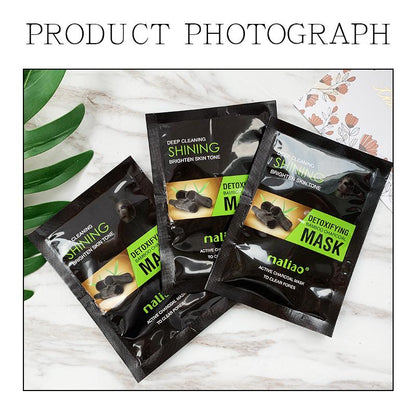 Three facial mask packets on a marble surface with green leaves. maliao.pk