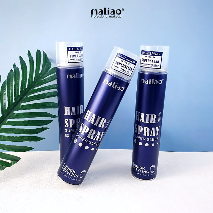 Three bottles of maliao hair spray on a white surface with a blue background