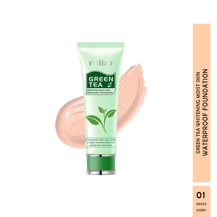 Green tea foundation tube with a swatch on a white background