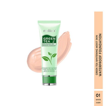Green tea foundation tube with a swatch on a white background