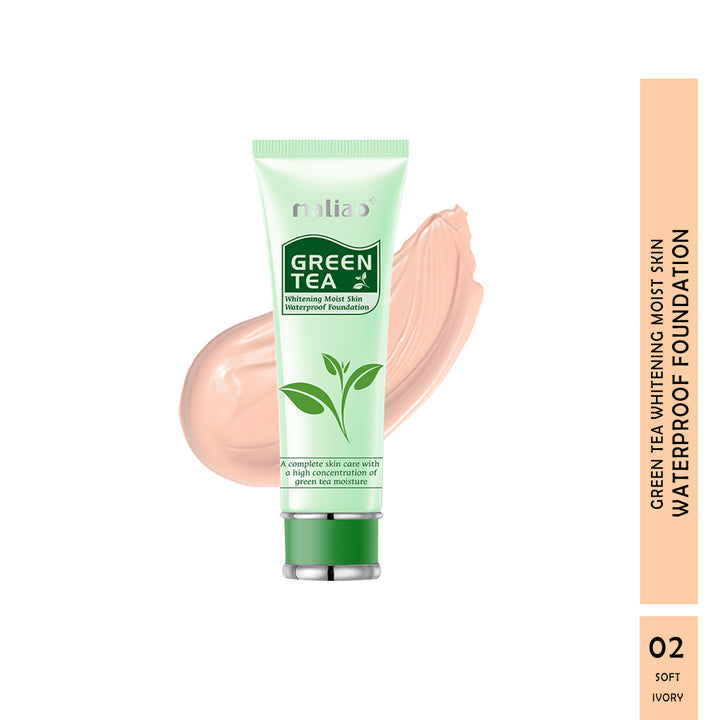 Green Tea foundation tube with a swatch on a white background