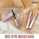 Maliao mascara with open cap on a textured beige background. maliao.pk