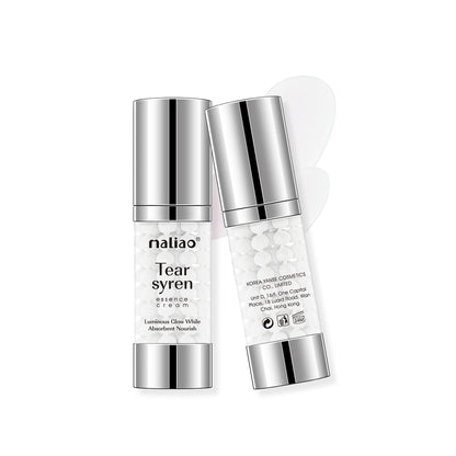Two skincare cream bottles with silver caps and white labels on a white background maliao.pk