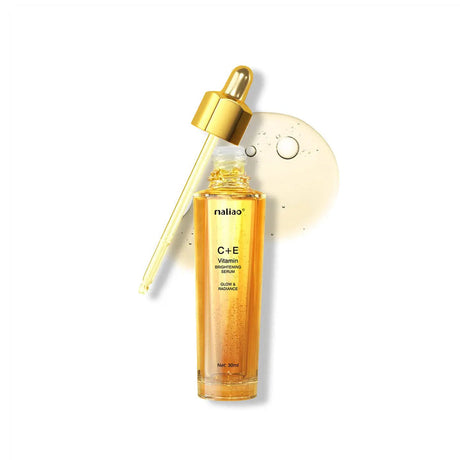 Vitamin C+E serum bottle with dropper on a white background. maliao.pk